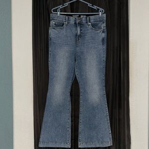 Torrid size 14R, bombshell flare premium stretch whitewash denim jeans